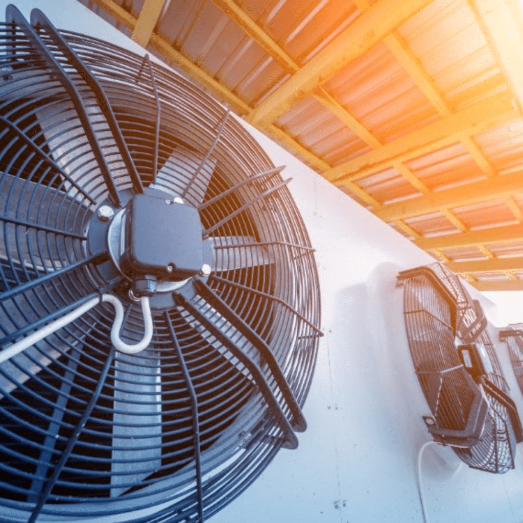 a close-up of commercial HVAC systems in a row